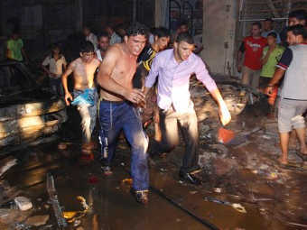При взрив на иракски пазар загинали 60 души