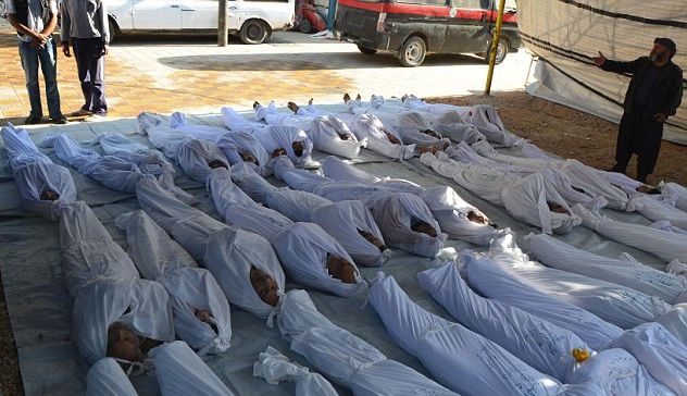 Най-мрачният час в Сирия: Стотици тела на деца едно върху друго след химическа атака (СНИМКИ/ВИДЕО 18+)