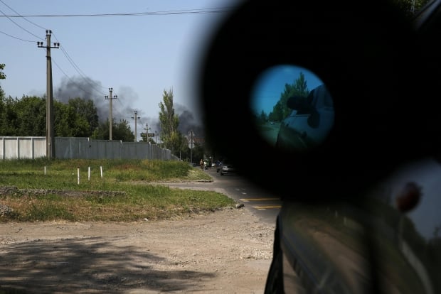 Жестоки боеве в Донецк, има загинали мирни граждани (СНИМКИ/ВИДЕО 18+)