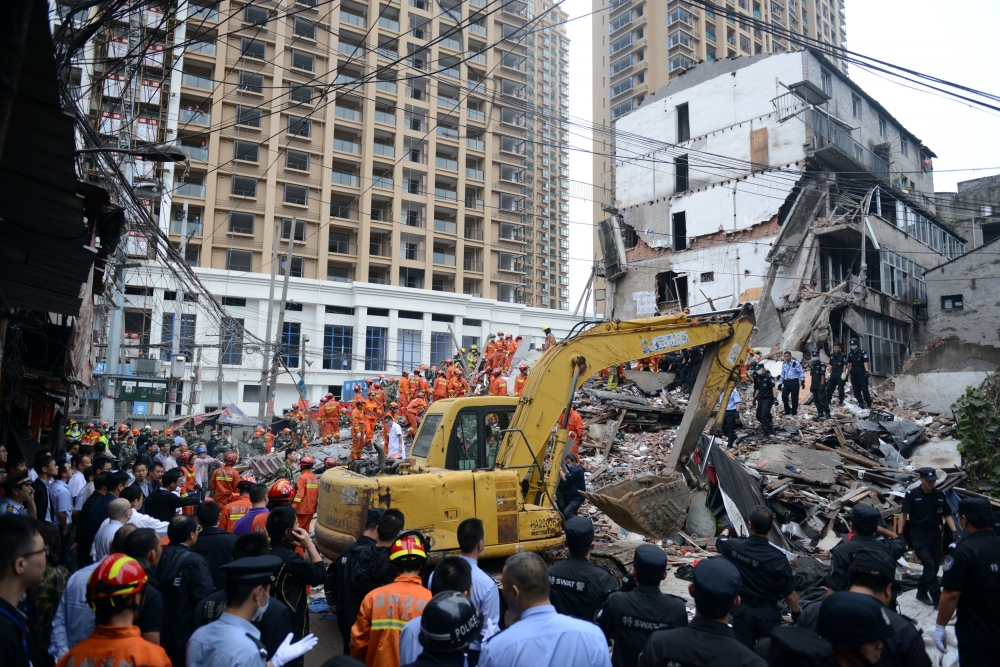 Жестока трагедия в Китай след срутване на няколко блока (СНИМКИ)