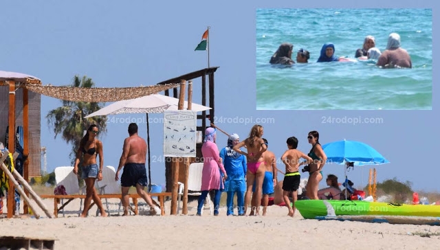Скандал разтресе Гърция! Полицай към мюсюлманка на плажа: Няма да влизаш във водата, ако...