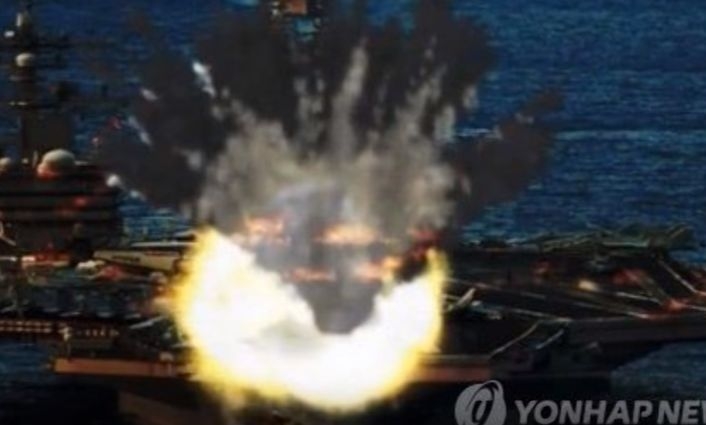 Война на нерви! Северна Корея публикува зрелищно ВИДЕО как унищожава американски бомбардировачи и самолетоносач 