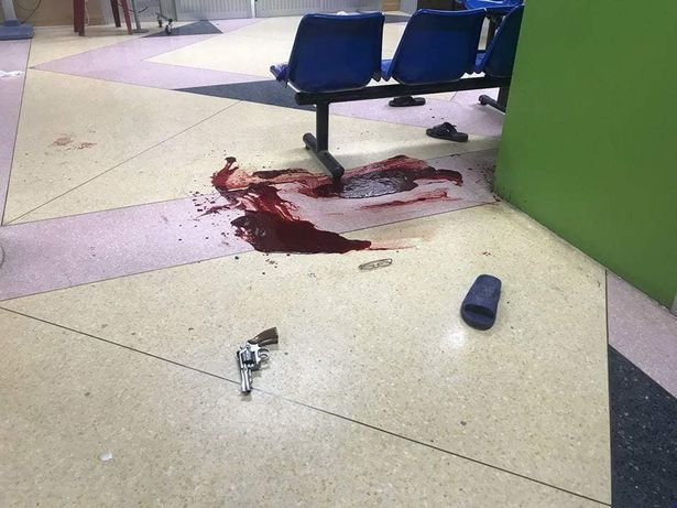 Мъж застреля съпругата си в болница пред очите на сина им, ето каква е причината (СНИМКИ/ВИДЕО 18+)