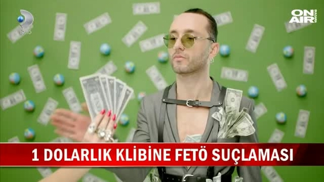 Разследват турски певец заради долари във видеоклип  