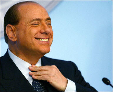 Берлускони "по-светъл" от Обама, не се бил пекъл на слънце известно време
