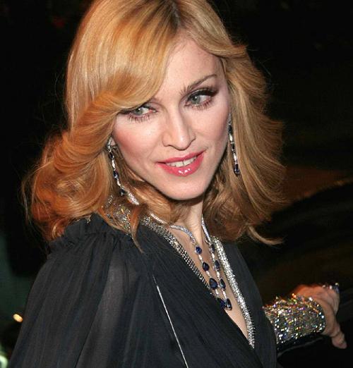Мадона не иска да осиновява сама, а с любовника си