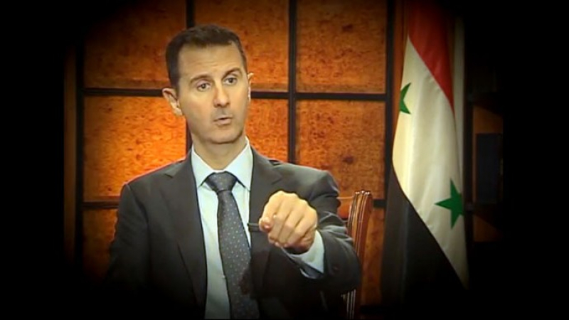Плутон бута Башар Асад