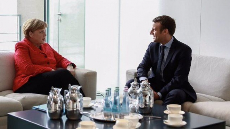 Меркел поздрави Макрон за „страхотен успех“