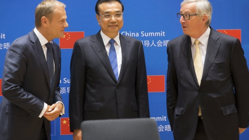ЕС и Китай съгласни за климата, разделени за търговията