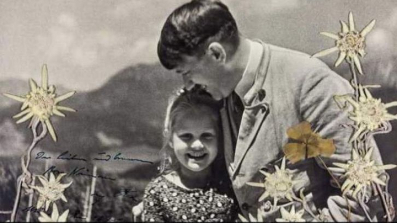 Продадоха за много пари легендарна снимка на Хитлер, на която целува внуче на еврейка 