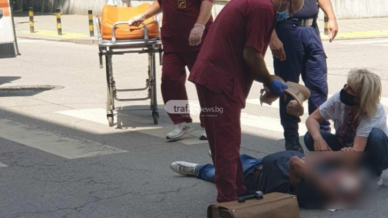 Инцидент до школо в Пловдив! Мъж лежи на пътя СНИМКИ 18+