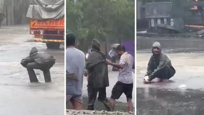 ВИДЕОТО е хит: Всички бягат от наводнението, но този човек има друг проблем 