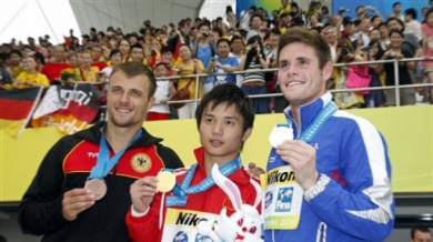 Китай спечели всички златни медали в скоковете във вода