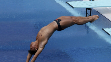 Китаец шампион на скокове във вода от еднометров трамплин