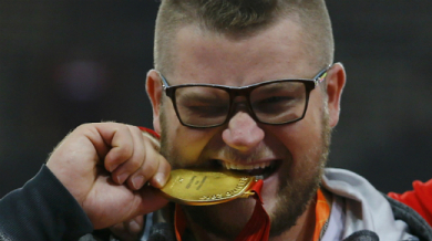 Пиян шампион плати такси със златен медал