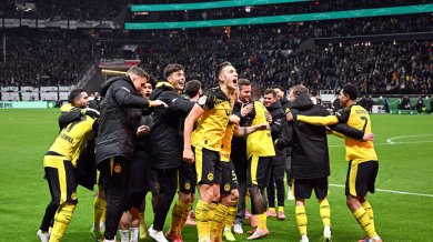 Рулетката на дузпи прати Дортмунд напред