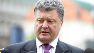 Порошенко иска да привлече НАТО в разминирането на складовете край Харков