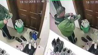 Мъж по чехли се спря пред вратата на апартамент, огледа се хубаво и направи нещо много гнусно (ВИДЕО)