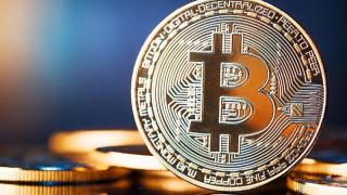 Биткойн поскъпна обратно над 50 000 долара