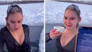 Изумително ВИДЕО: Рускиня излезе от замръзнало езеро и пие кафе при -27 градуса