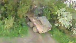 ВИДЕО от войната: Дрон-камикадзе на ВСУ удари рядък БТР-80 с ракетни установки