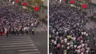 Удивително: Вижте как китайската полиция регулира движението на пешеходците Видео