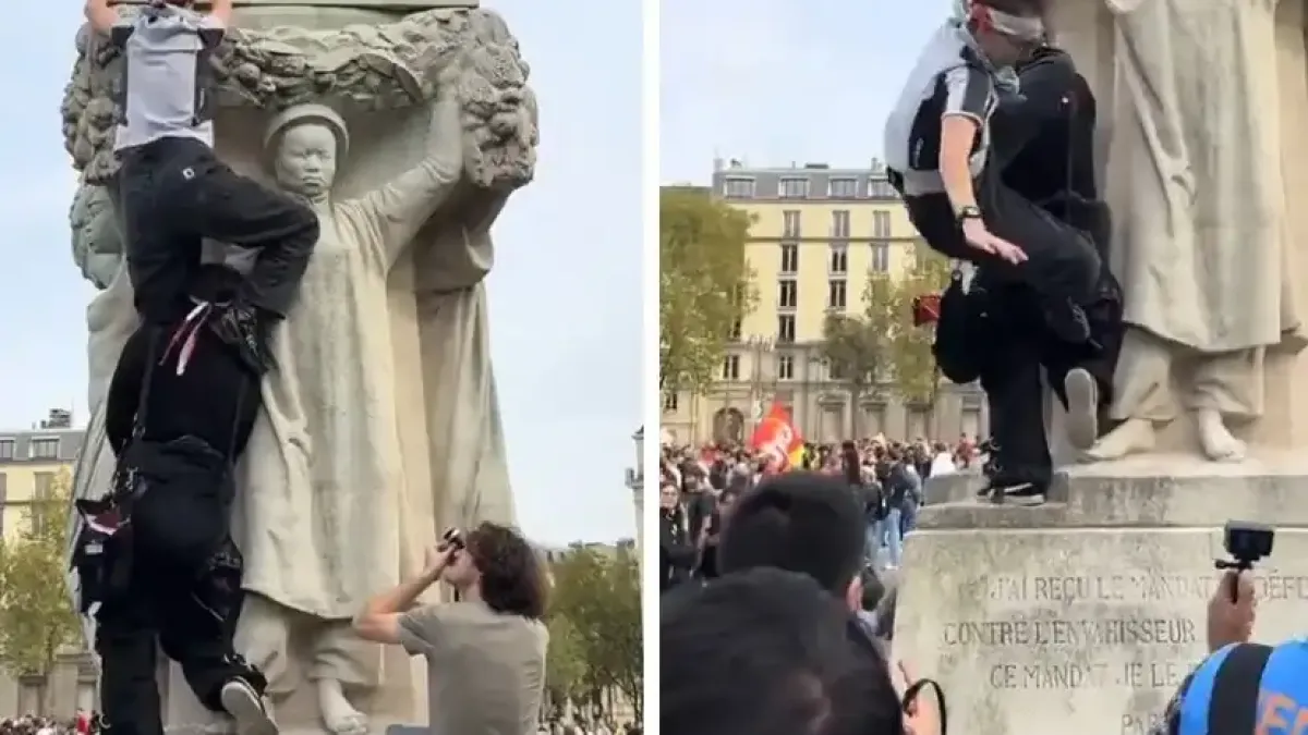 Жена падна от статуя по време на протест Видео 18+