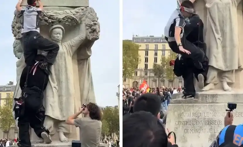 Жена падна от статуя по време на протест Видео 18+