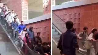 Ескалатор с много хора внезапно ускори ход, ето какво се случи Видео